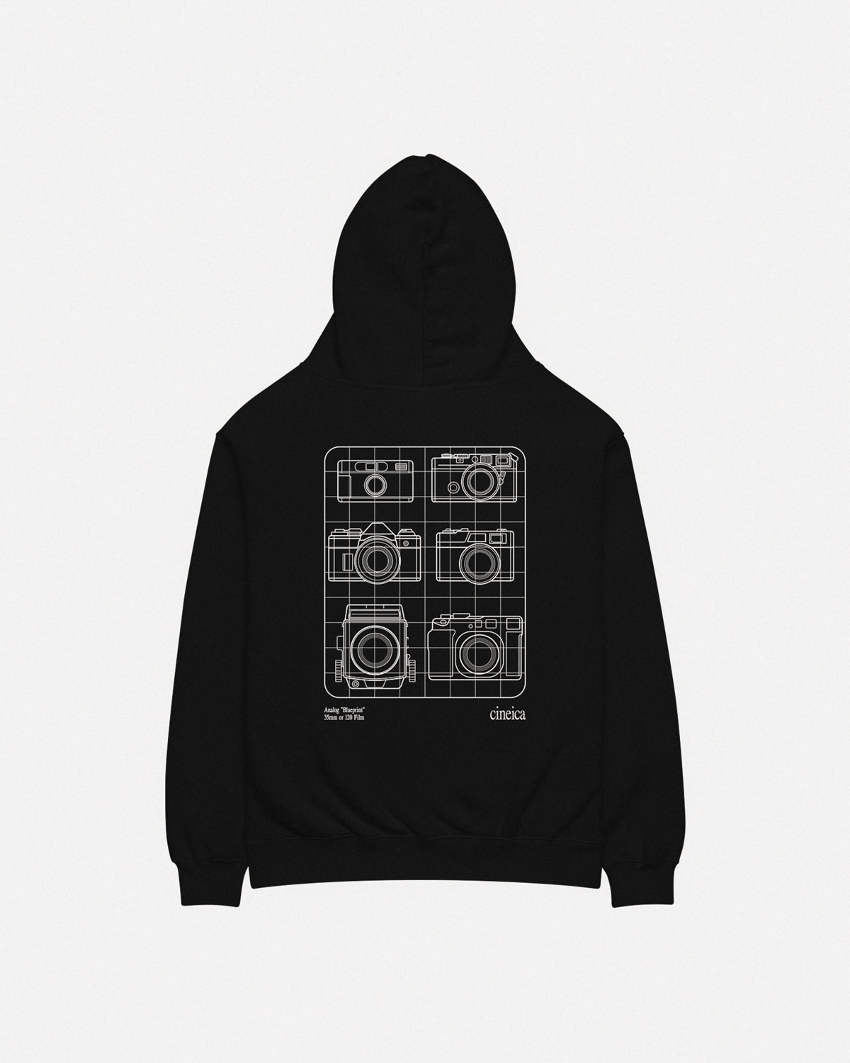 Photo of the back of a black cineica "Blueprint Hoodie". The white design showcases six iconic analog film cameras and the text "Analog 'Blueprint", "35mm or 120 Film".