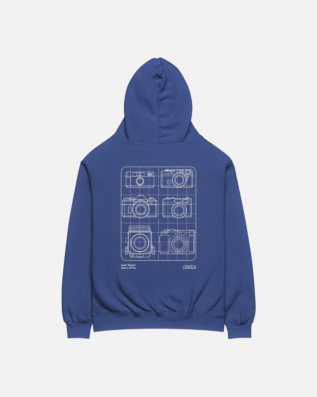 Photo of the back of a blue cineica "Blueprint Hoodie". The white design showcases six iconic analog film cameras and the text "Analog 'Blueprint", "35mm or 120 Film".