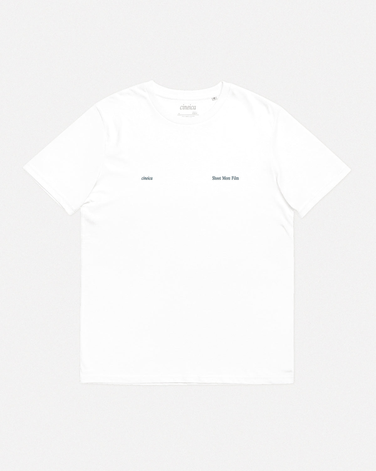 Flatlay of Shoot More Film T-Shirt with left-chest branding – 100% organic cotton tee with analog photography design.