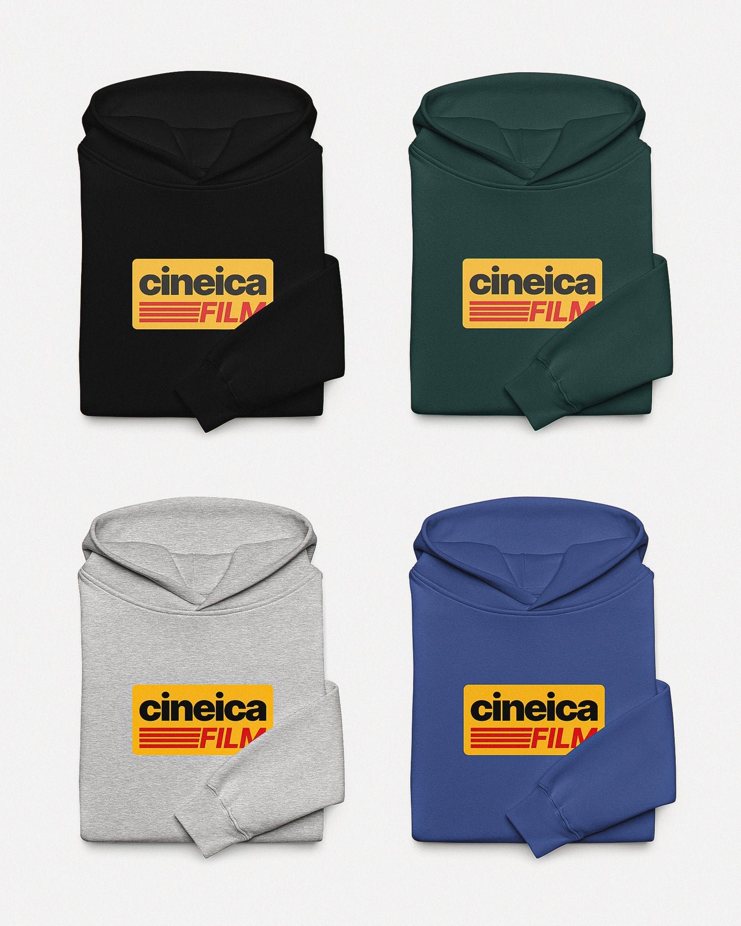 Photo of multiple cineica hoodies in different colors. The design features a yellow graphic with black and red text in a vintage style, the text states "cineica FILM".