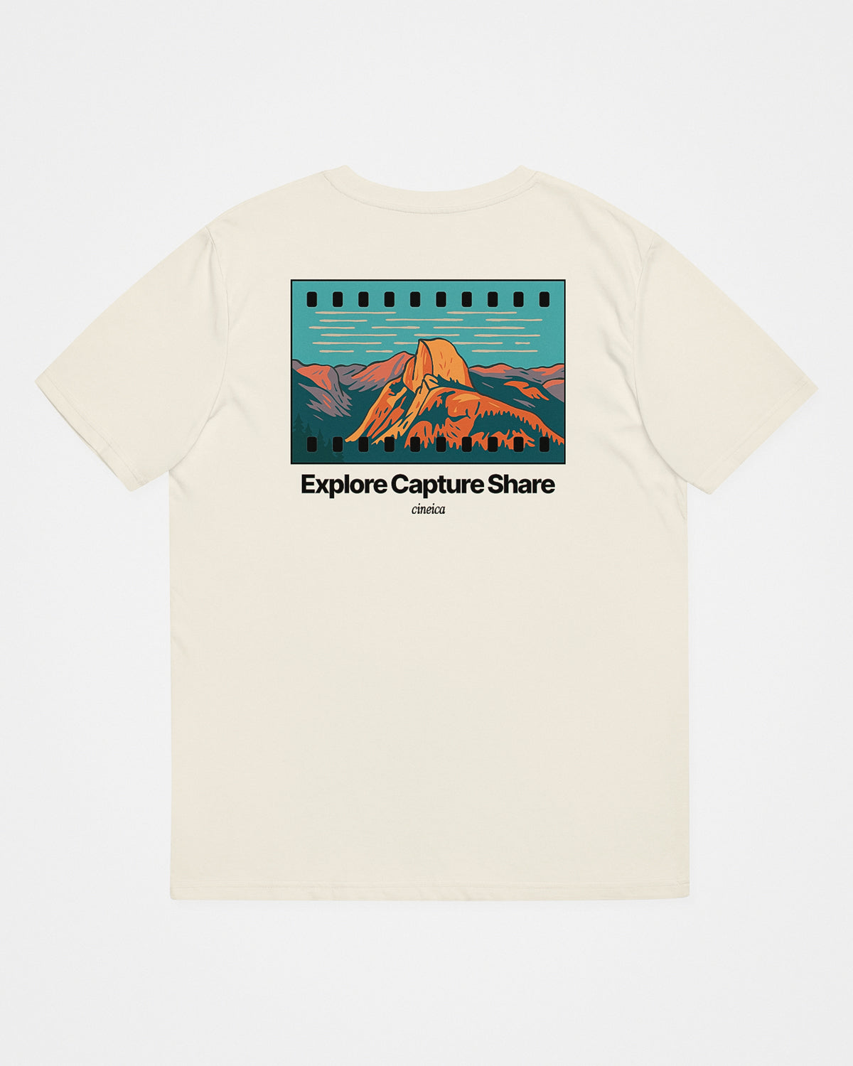 Back of a natural beige t-shirt with text “Explore Capture Share” and a design of a 35mm film strip with Yosemite National Park and Half Dome.