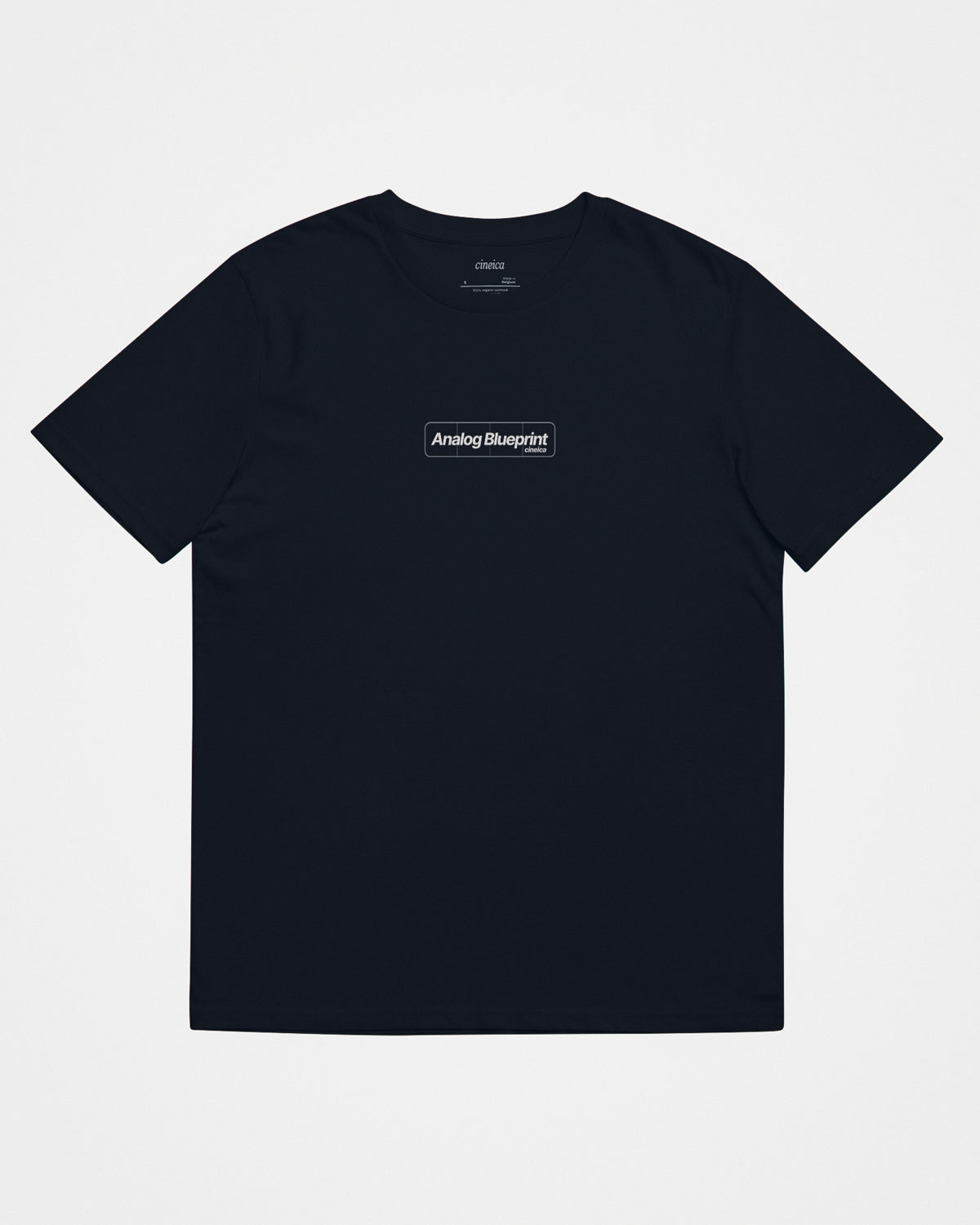 Front of a navy t-shirt with text "Analog Blueprint", "cineica".