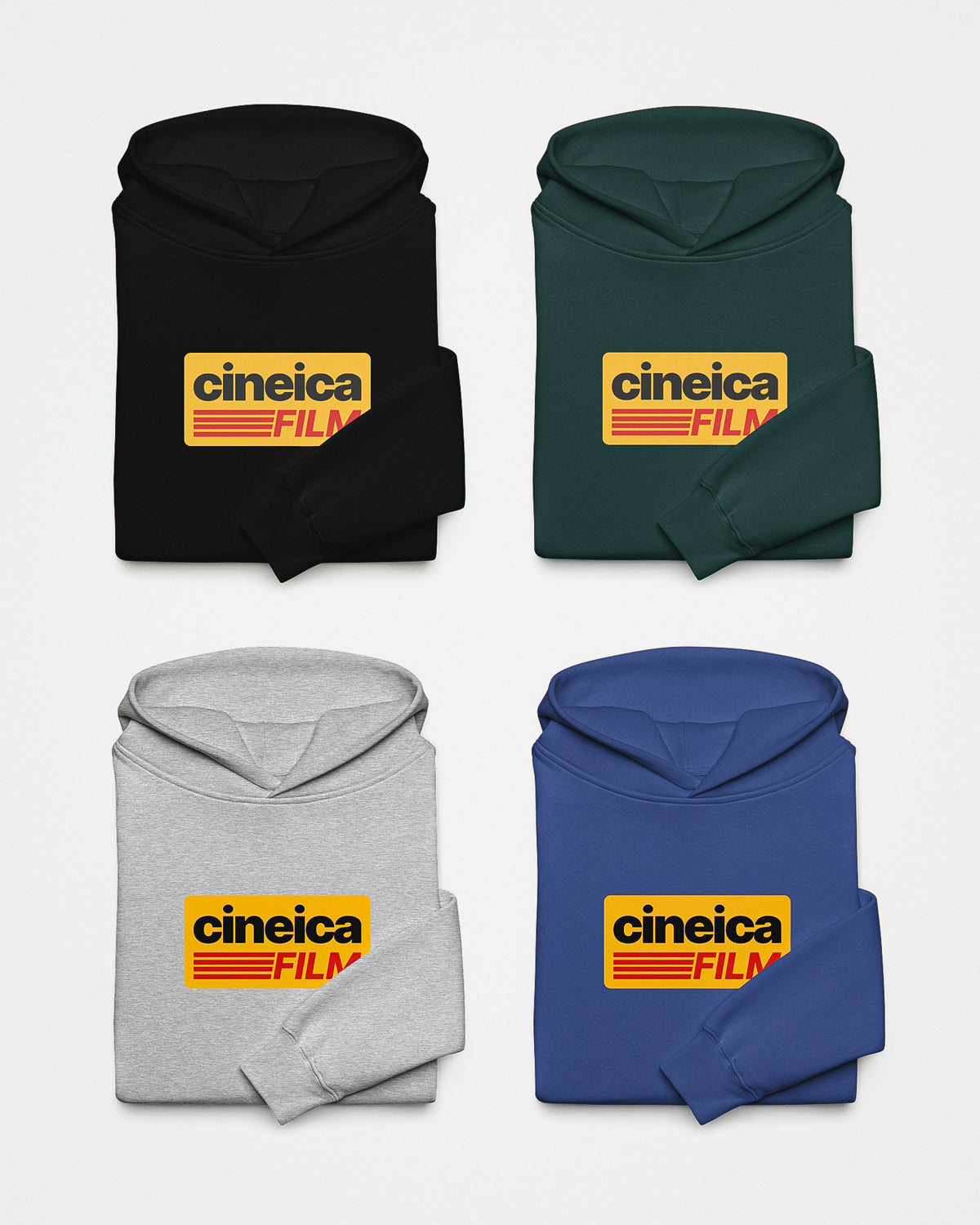 Fronts of a black, green, gray, and blue relaxed hoodie with a vintage retro design with Kodak Film colors and the text "cineica film".